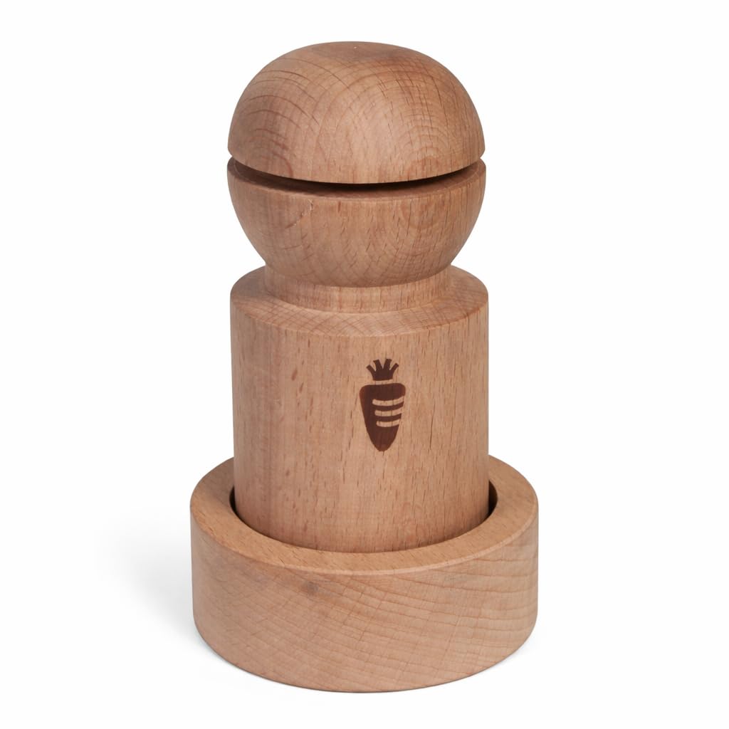 Carrot Design newspaper pot maker handle roll forms biodegradable seed pots.