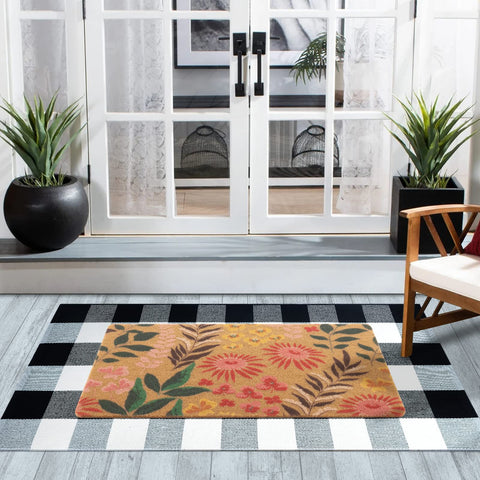 Carvapet indoor-outdoor doormat suited for porches, patios, and entries.