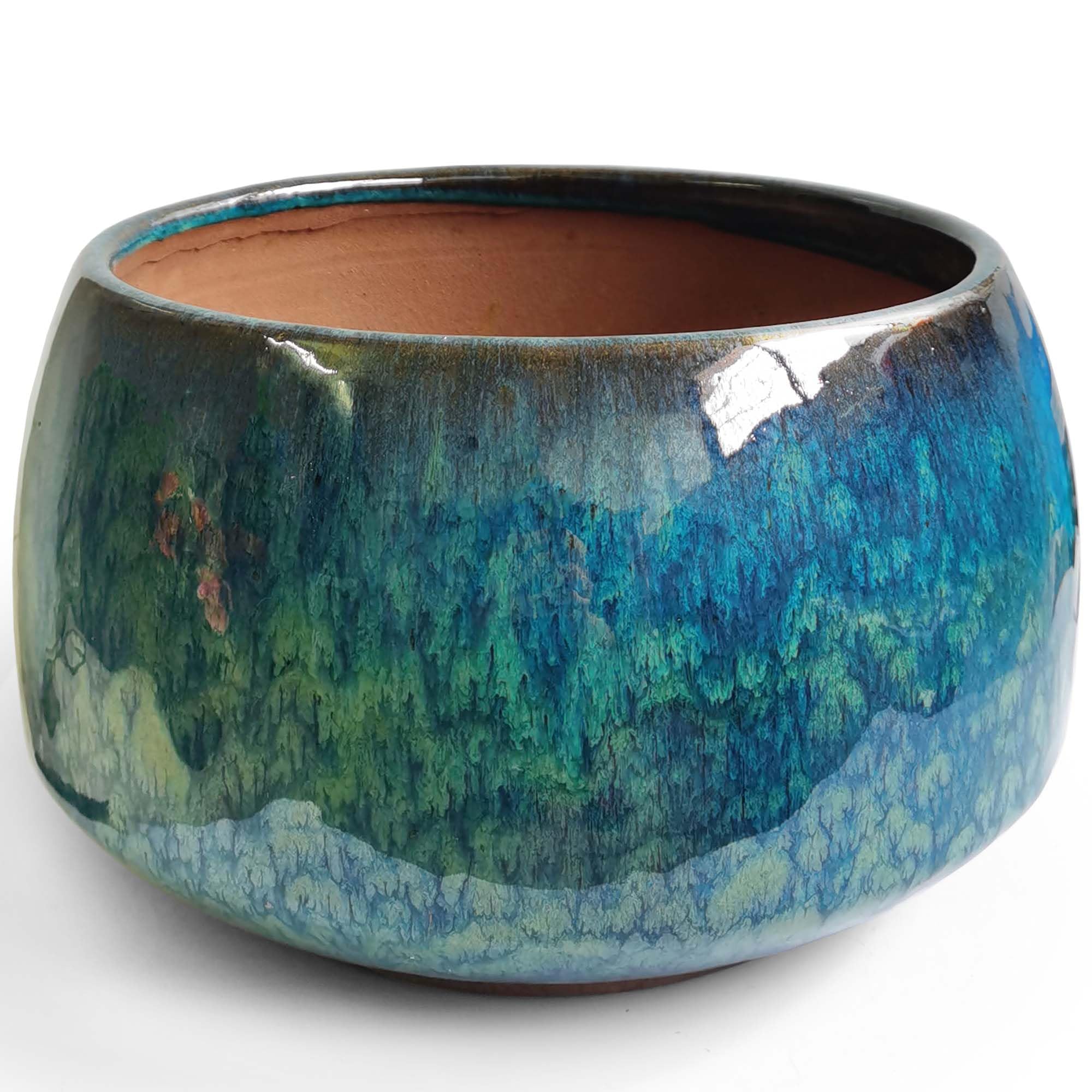 Casktcom Peacock glaze 11-inch pot with drainage, ideal for indoor tropical plants.