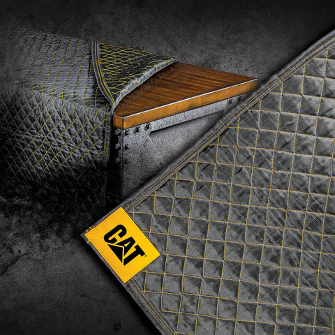 CAT Utility Padded Moving Blanket texture close-up showing heavy-duty polyester for lasting use.