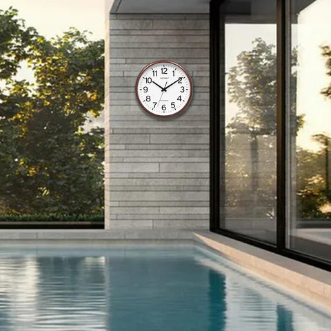 Caysie brown clock with flat glass lens is easy to clean.