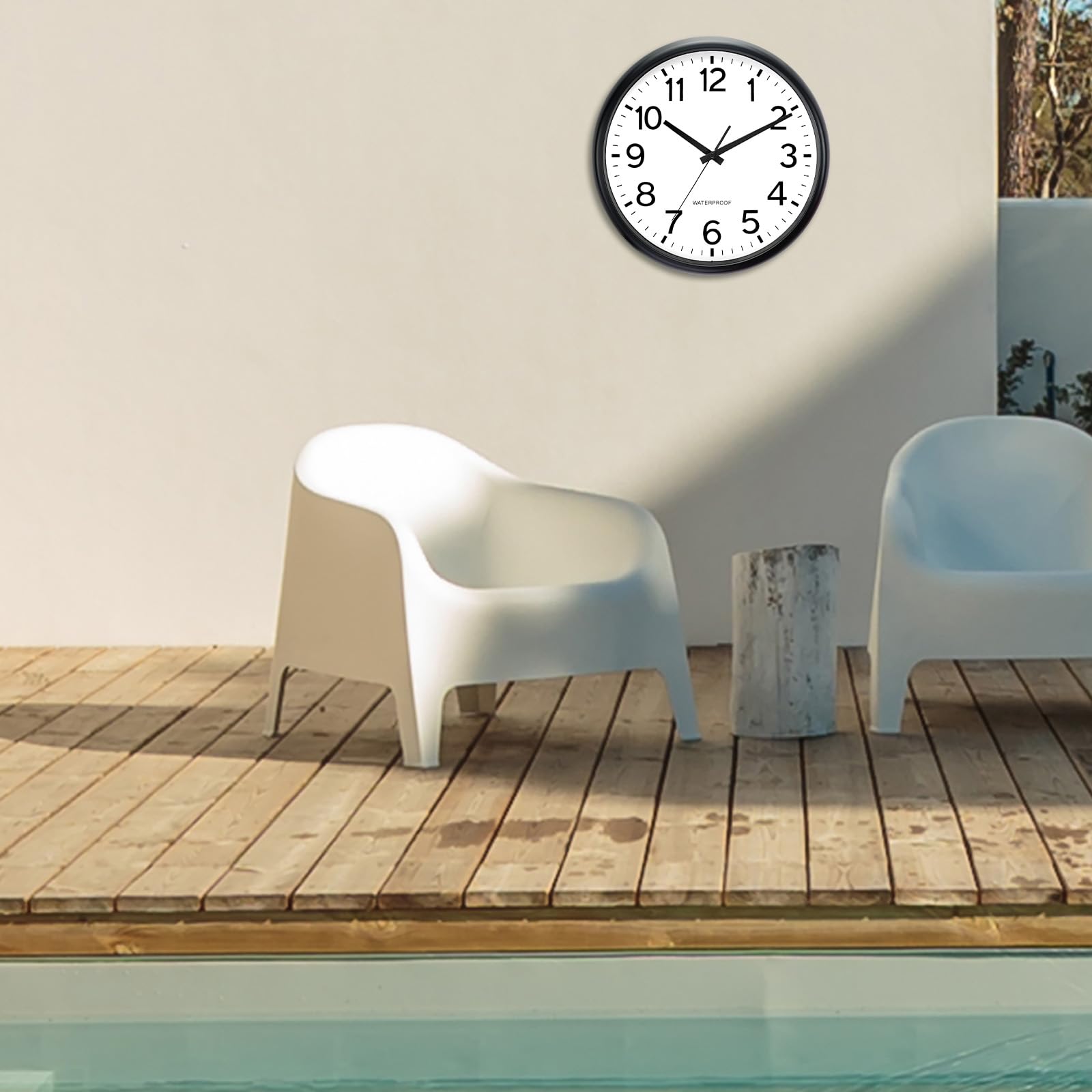 Caysie clock shows easy mounting with hanging hook and back slot.