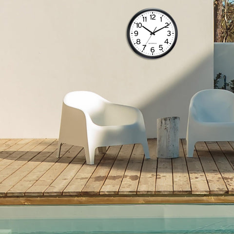 Caysie clock shows easy mounting with hanging hook and back slot.