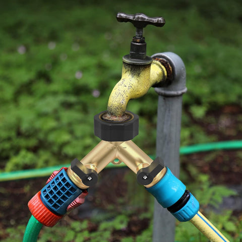 Cbumane outdoor water access for multiple hoses from a single faucet.
