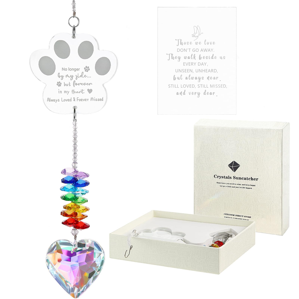 Ceegook dog memorial crystal suncatcher paw motif reflects rainbow light in sun