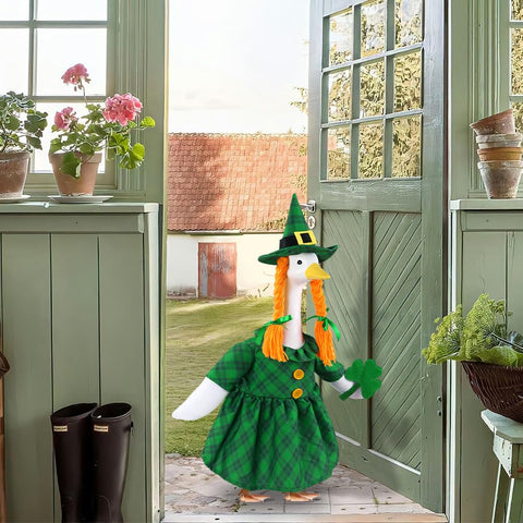 Celltestria shamrock-hand prop brightens lawn goose statue.