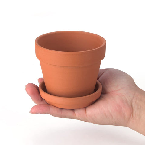 Close-up of CFKJ 4-inch terracotta pot with smooth, breathable finish