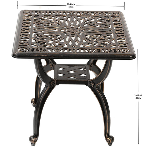 C/G Patio Casa end table features intricate scrollwork and a durable, weather-resistant finish.