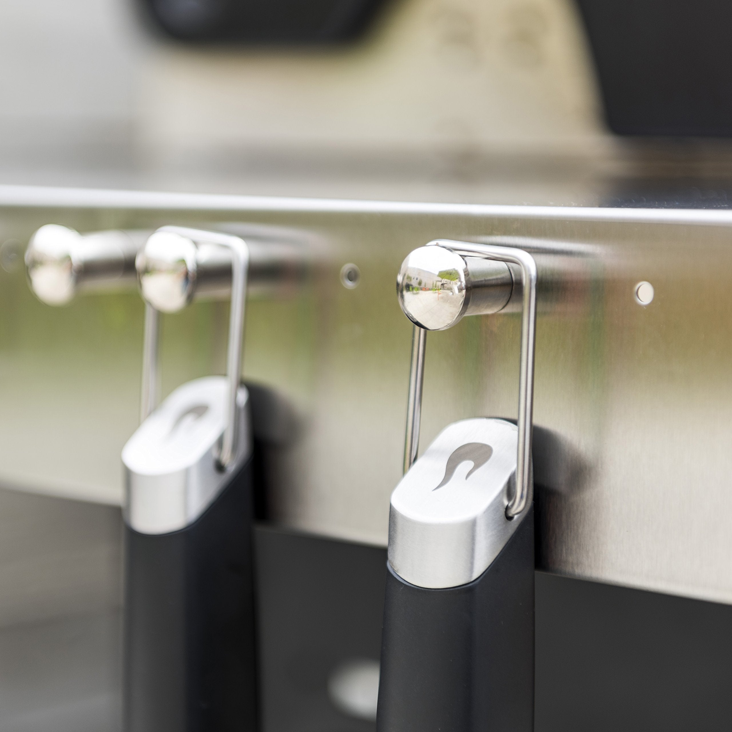 Charbroil 4-pack grill tool hooks provide versatile storage for spatulas and tongs.