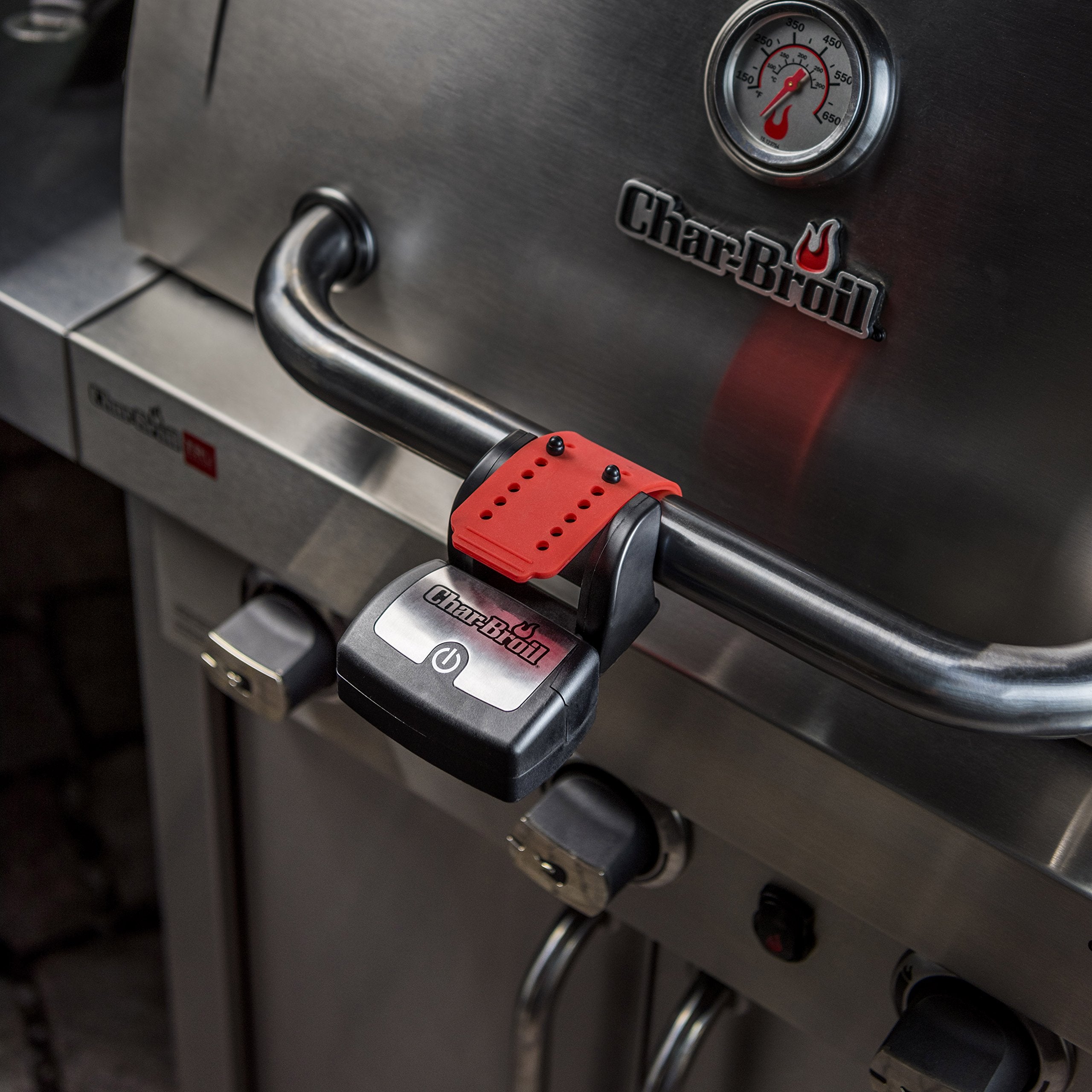 Charbroil LED Grill Handle Light in action during a night barbecue.