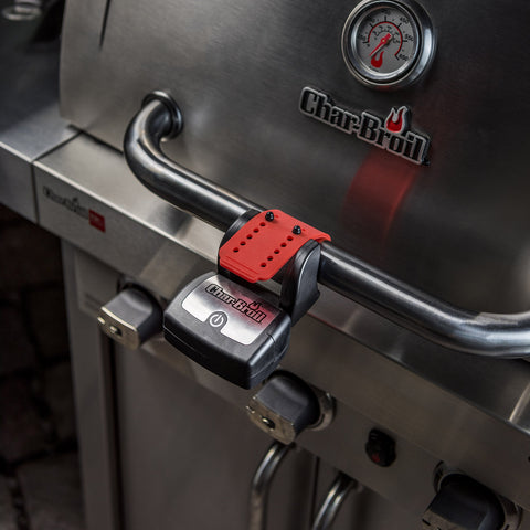 Charbroil LED Grill Handle Light in action during a night barbecue.