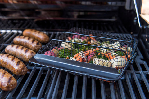 Fish, kebabs and small items searing in the Char-Broil grill basket