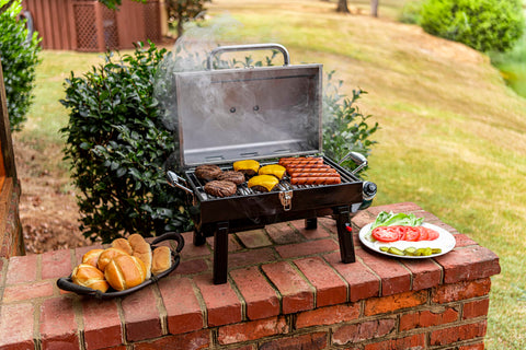Charbroil piezo electric igniter lights with a push of a button.