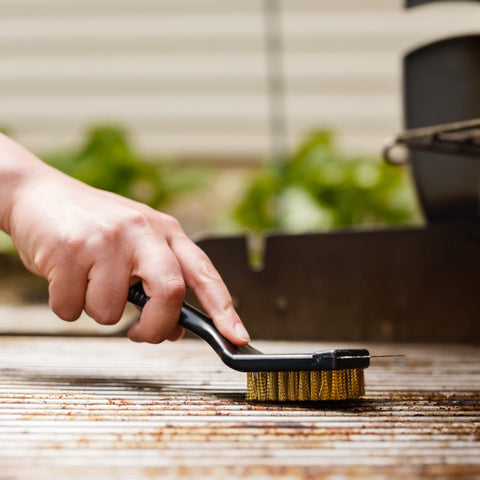 Chef Craft brush stored compactly beside grill tools.