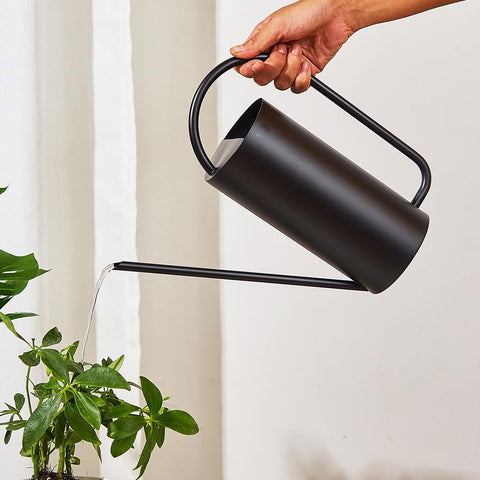 Chemlliy watering can with comfortable handle for easy grip during use.