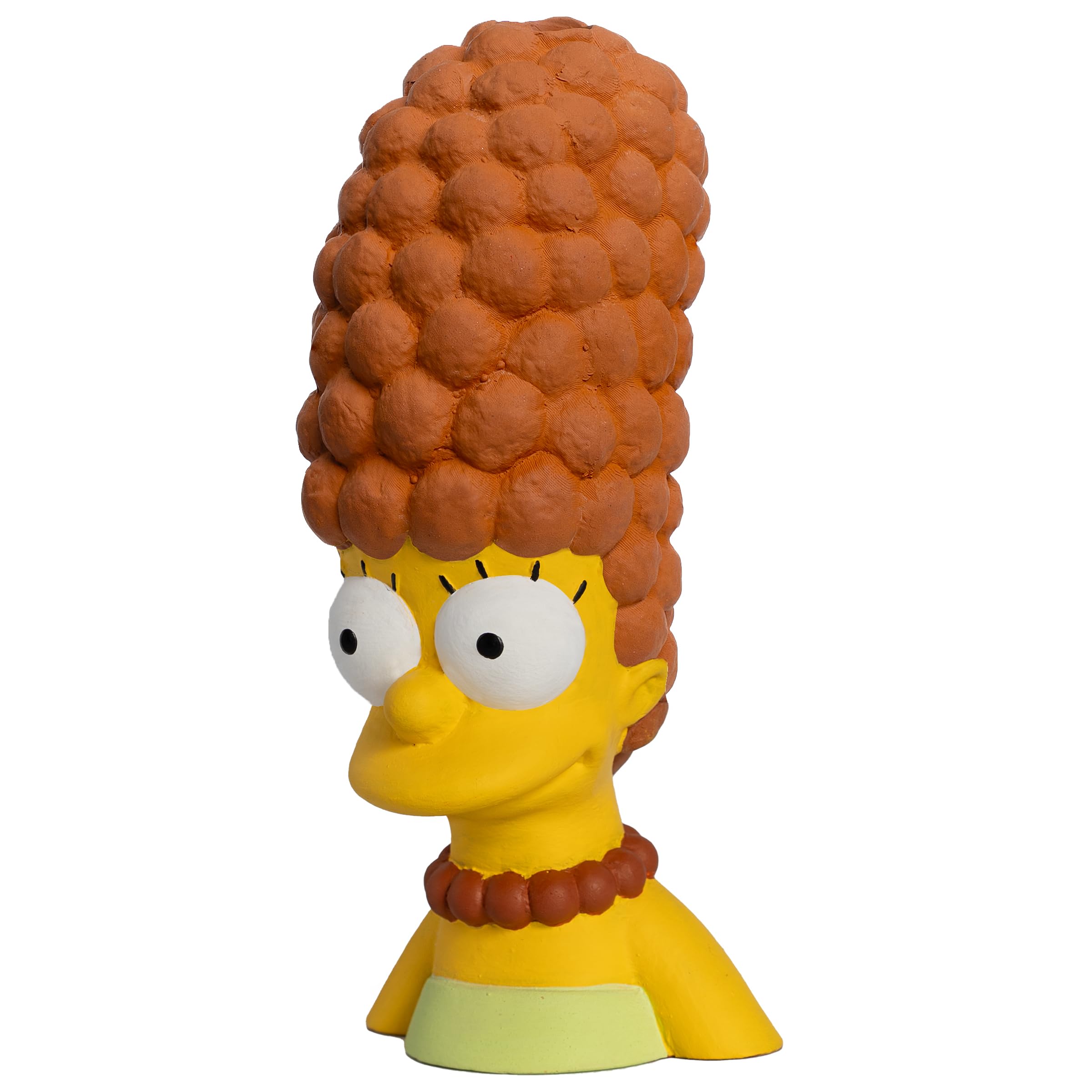 Chia Pet Marge with seed pack shows initial sprouting phase for interactive fun.