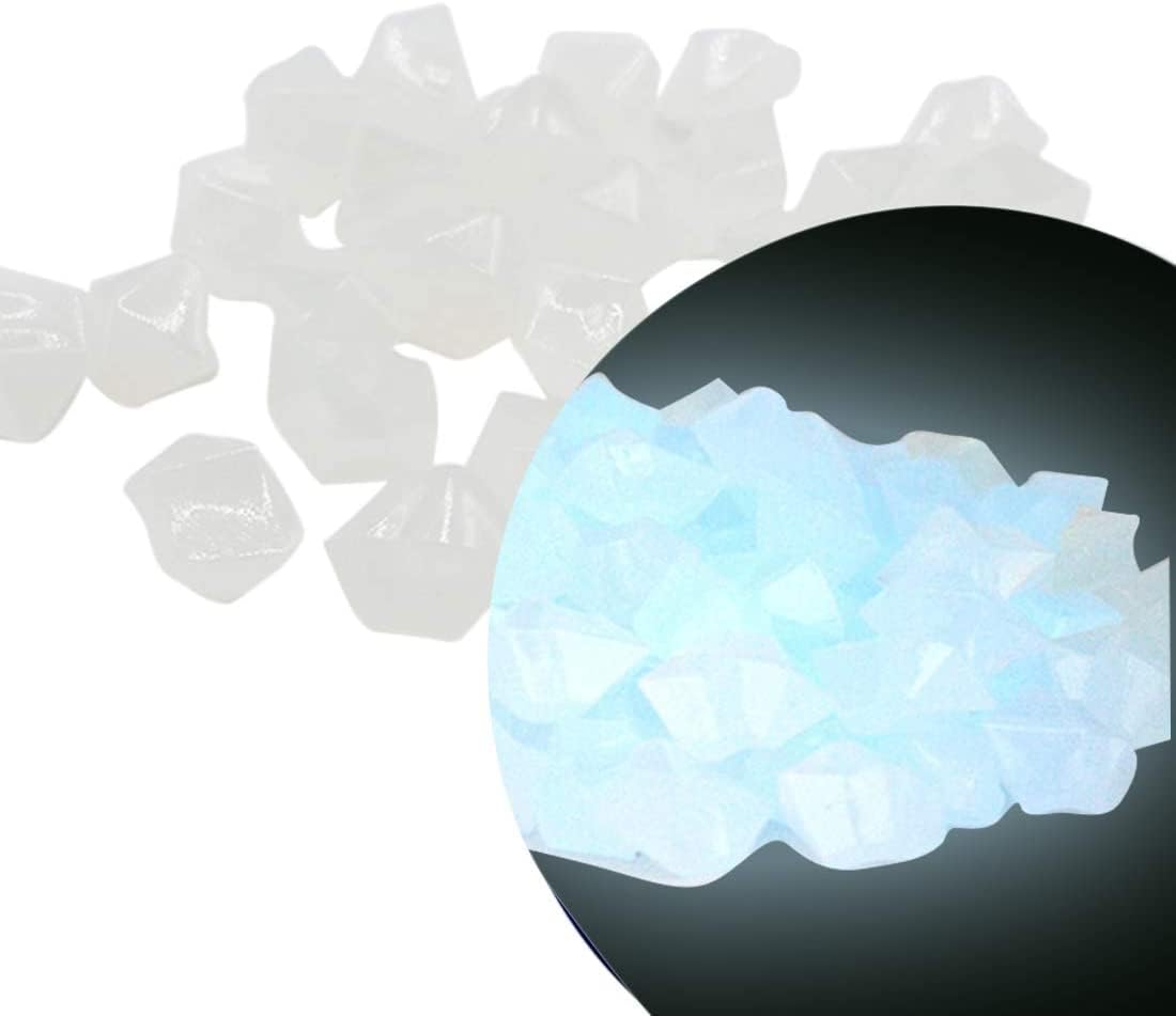 Chic Style Glow Stones glow blue at night for safe garden paths.