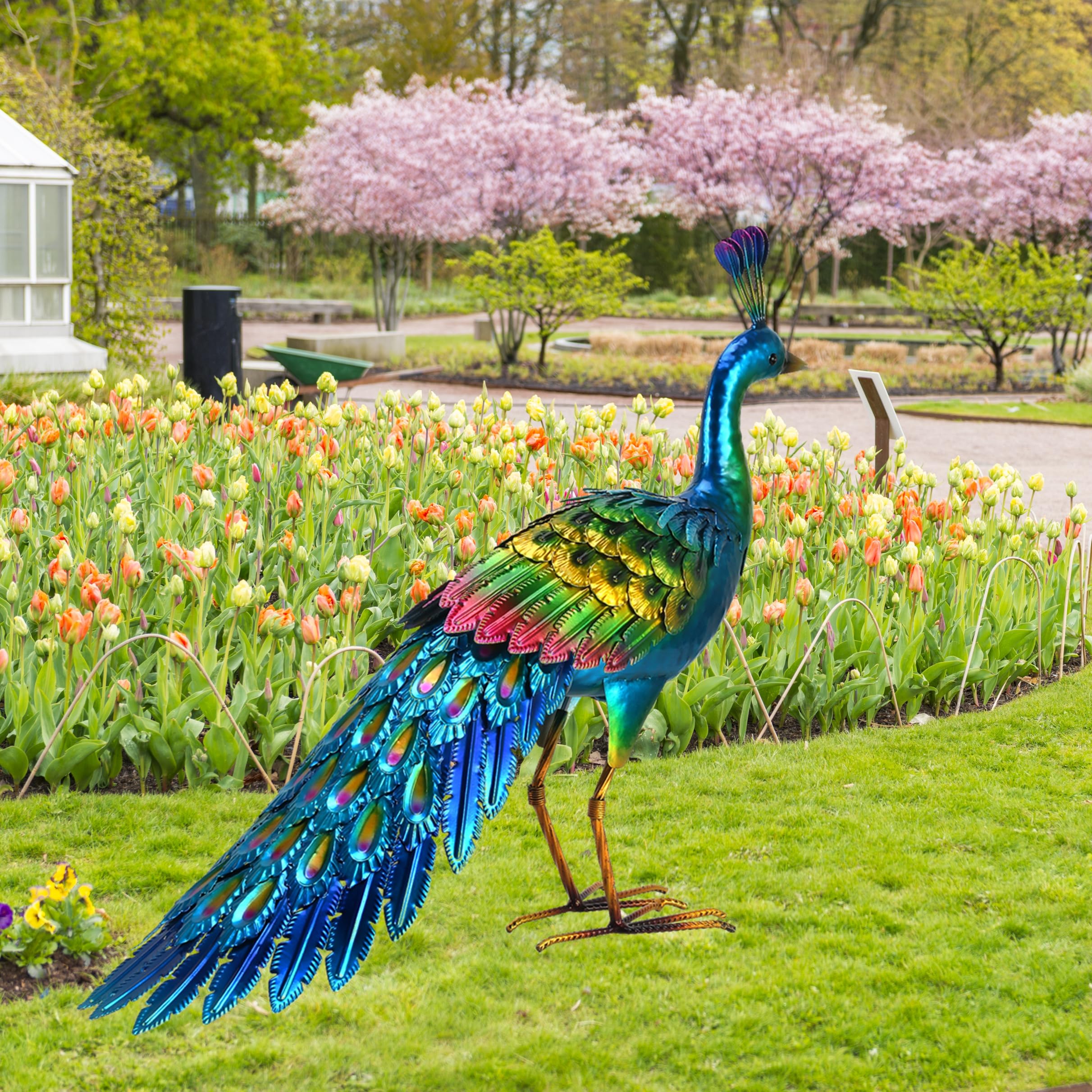 chisheen metal peacock statue flowing-tail accentuates garden paths