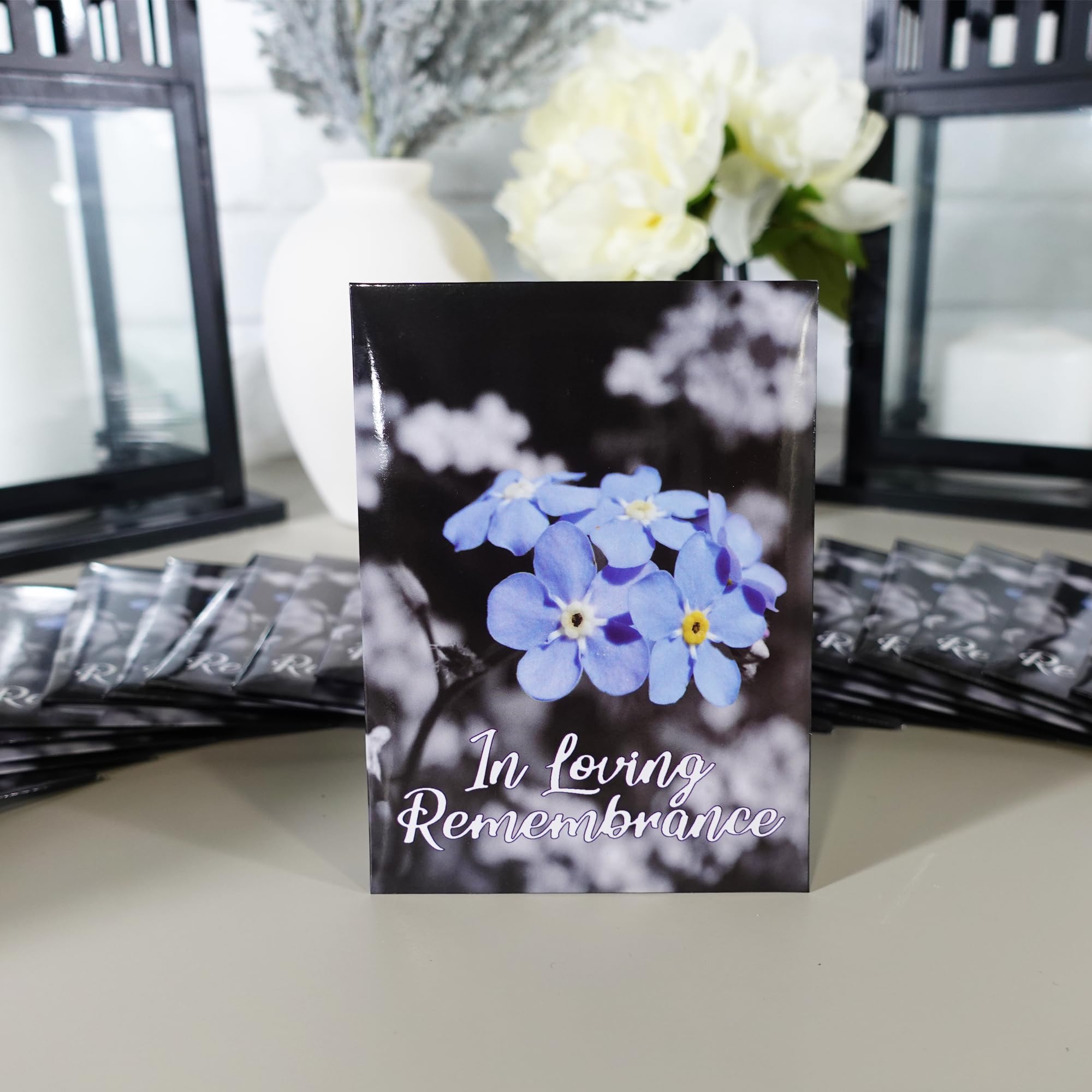 Choobly memorial decor seed packets on display for table centerpieces