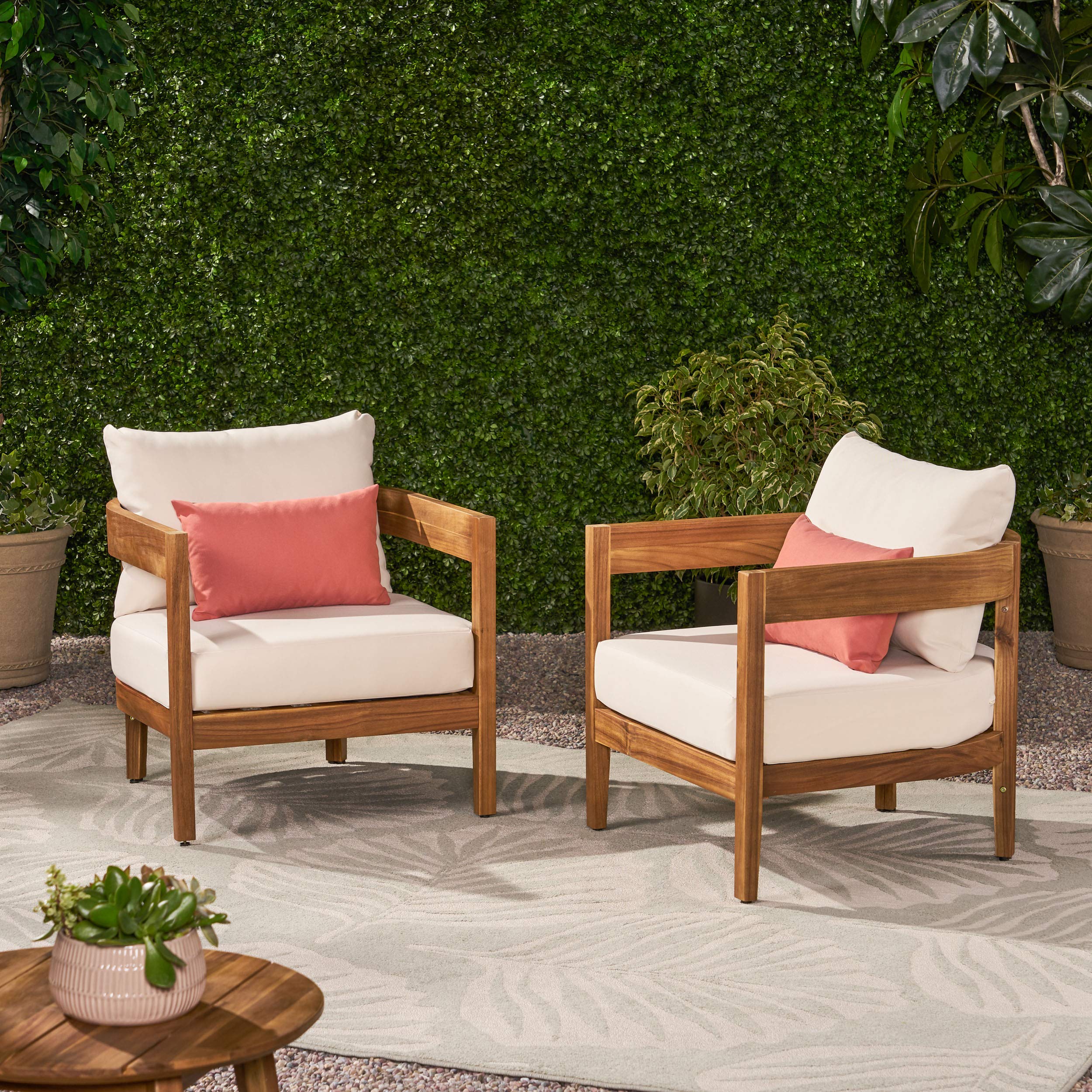 Alfy chair close-up showing teak finish for premium backyard look