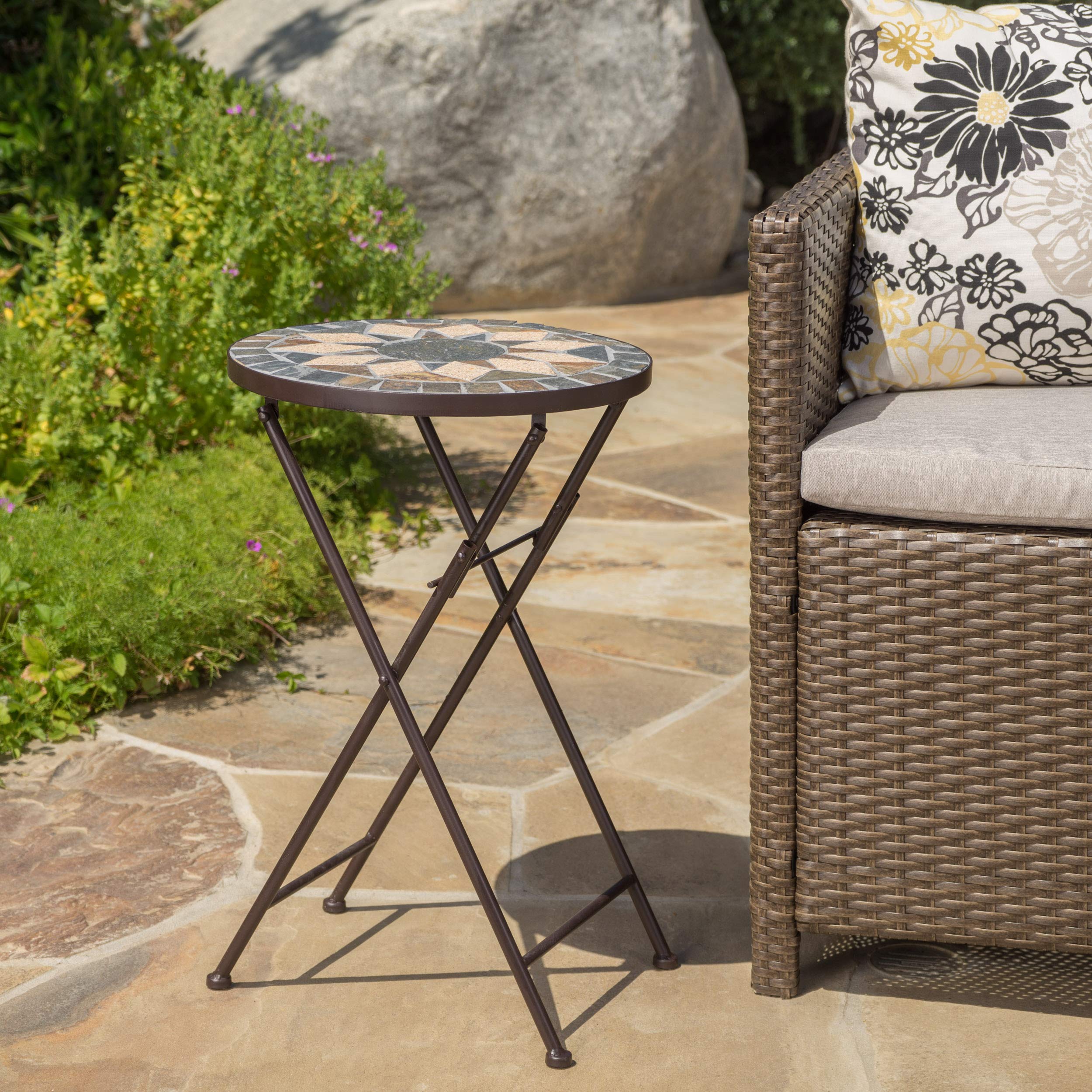 Christopher Knight Home Silvester mosaic stone top provides a sturdy surface.