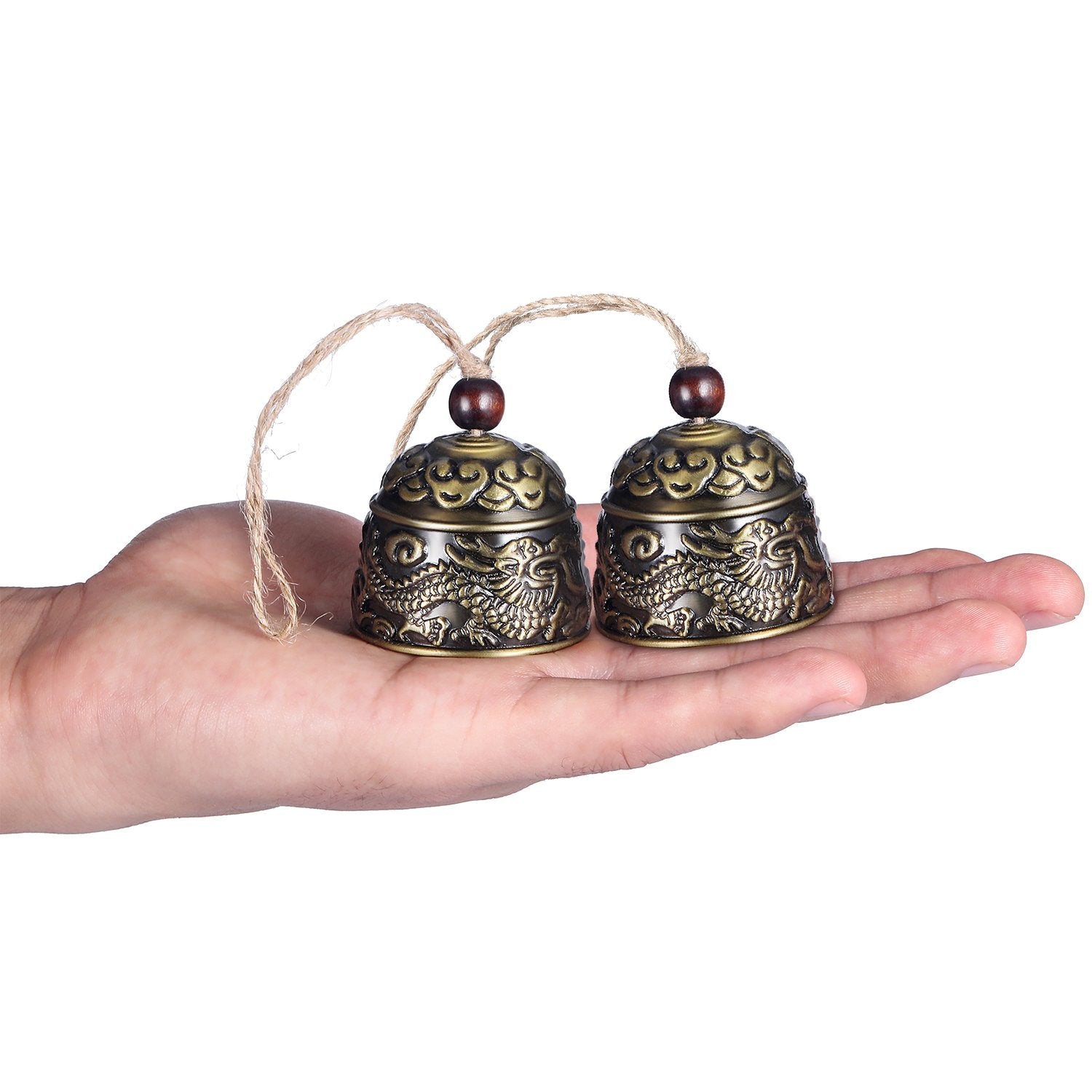 Chuangdi fish and cloud motif bell enhances indoor Feng Shui decor.