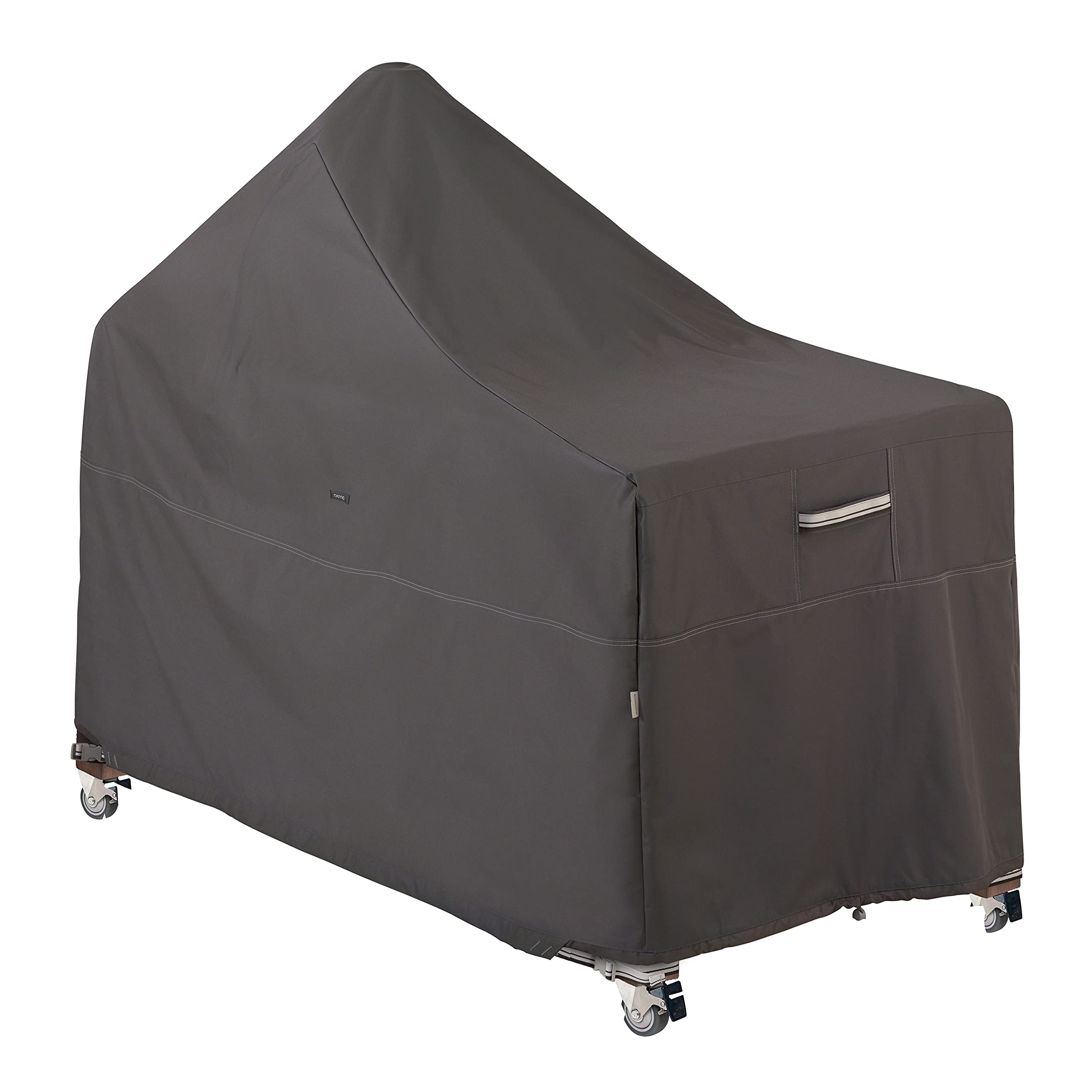 Classic Accessories Ravenna 60in Kamado cover shields a ceramic grill from rain.