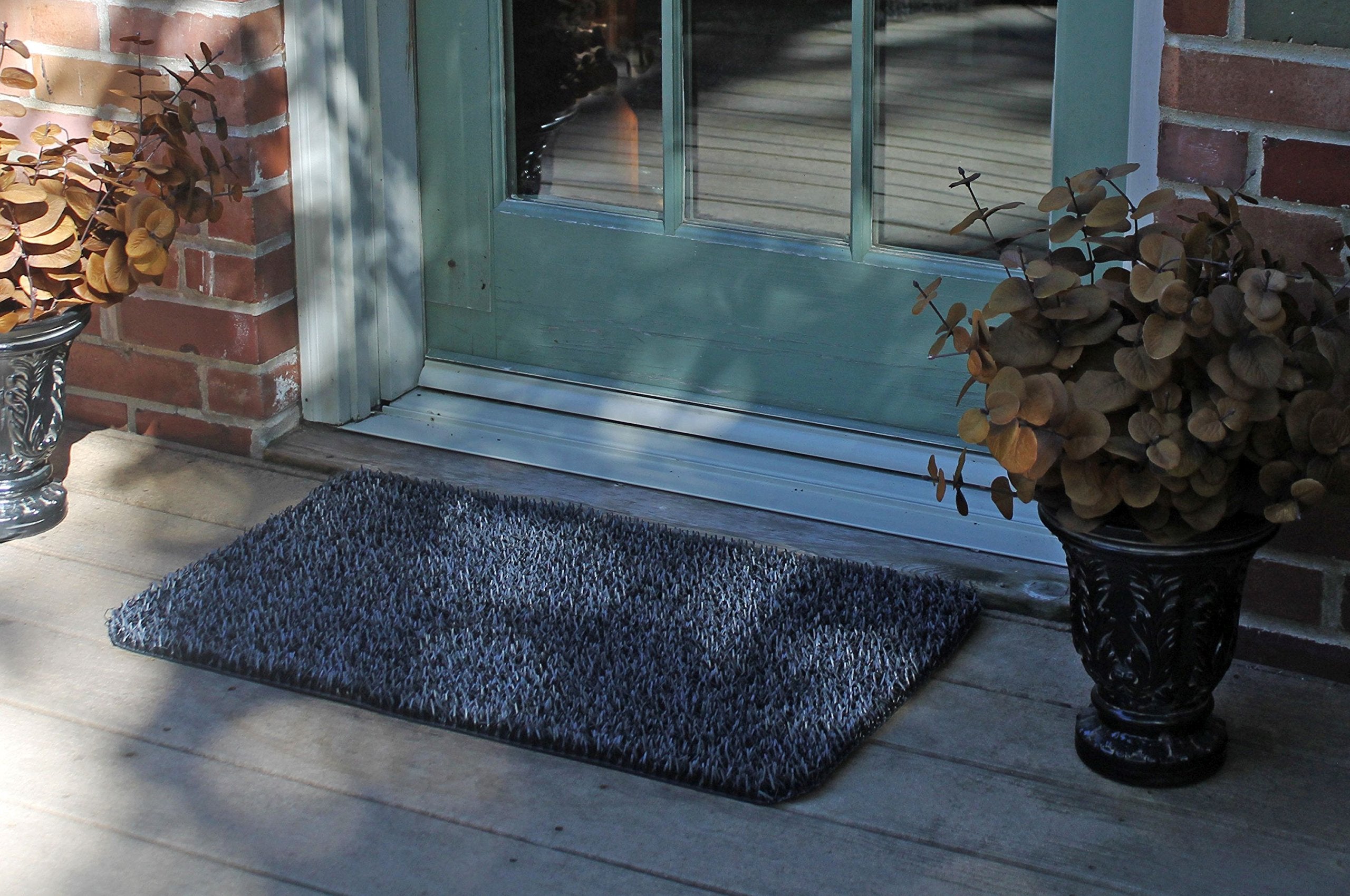 Easy-clean design on Clean Machine AstroTurf mat resists fading