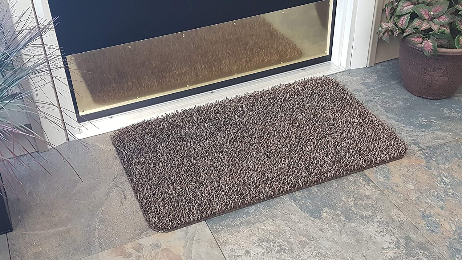 Dirt collected beneath the surface of the Dirt Trapper Doormat for cleaner floors.
