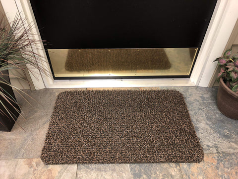 Close-up of scraper blades on Clean Machine Dirt Trapper Doormat.