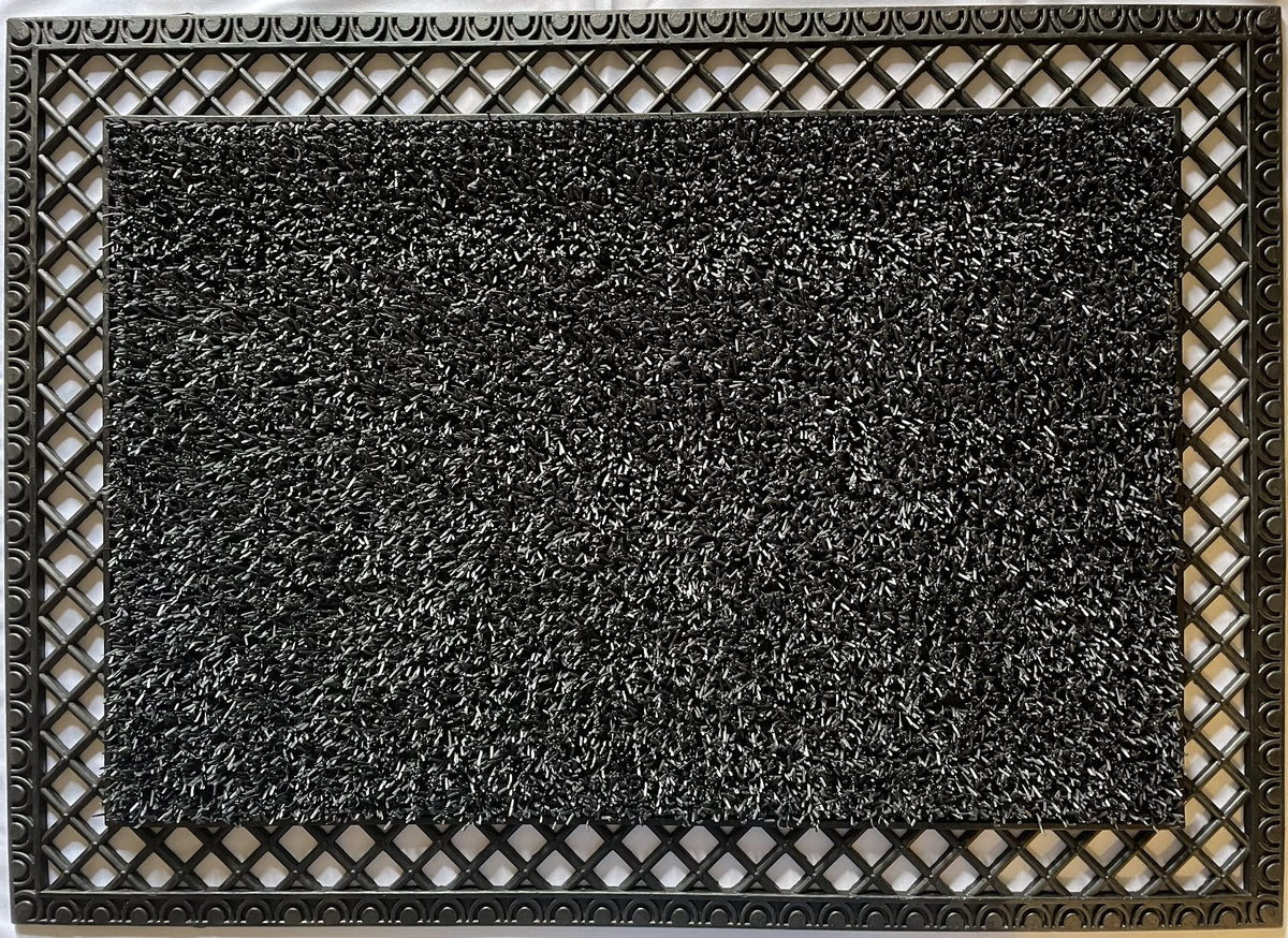 Clean Machine French Quarter Astro Turf Doormat traps dirt at the doorway.