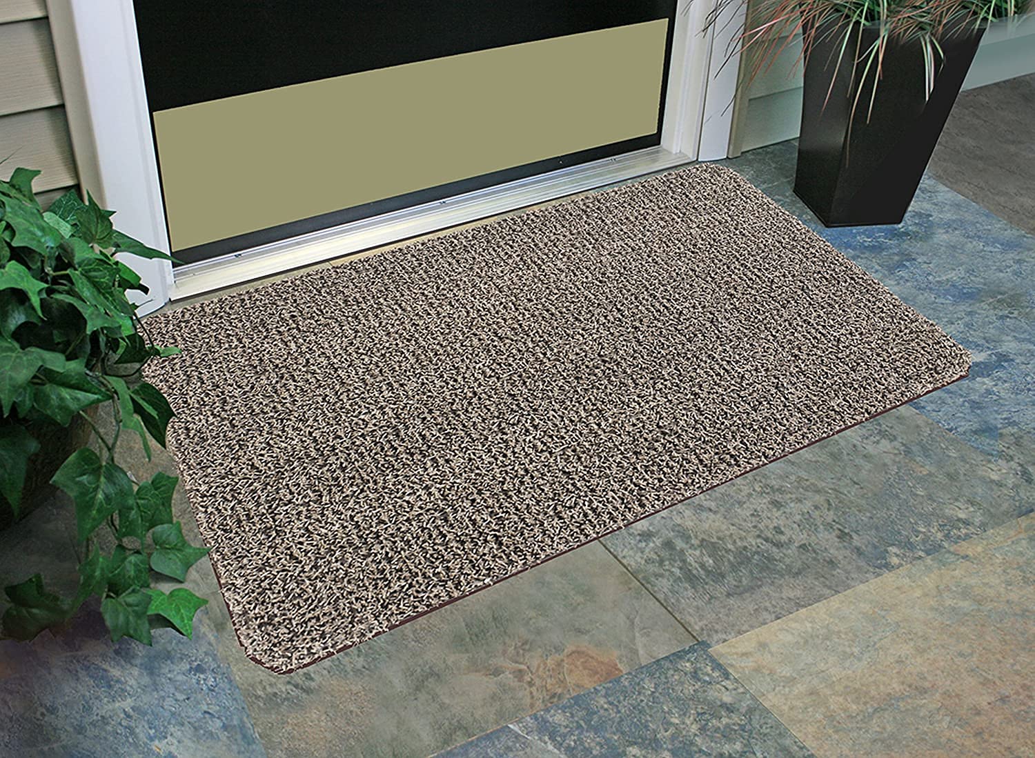 Clean Machine outdoor doormat at front door shows versatile use.