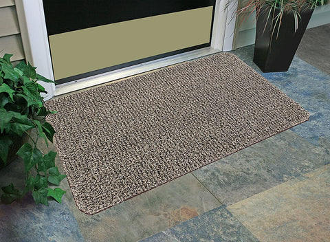 Clean Machine outdoor doormat at front door shows versatile use.