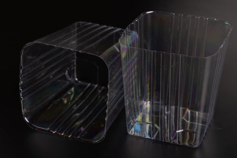 Clear Plastic Liner protecting wood boxes and surfaces from moisture and spills.