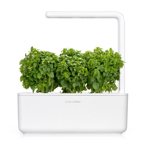 Pod insertion into Click and Grow makes planting effortless