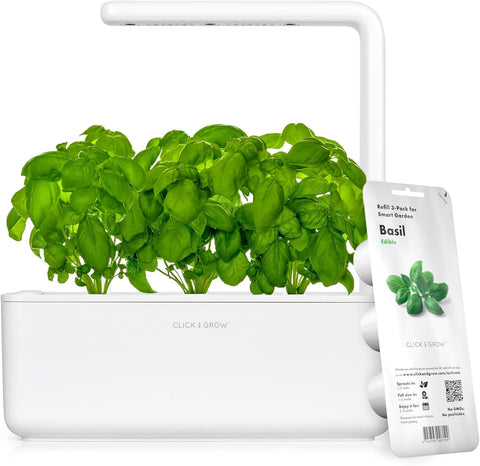 Click & Grow indoor herb garden kit on a countertop for fresh herbs.
