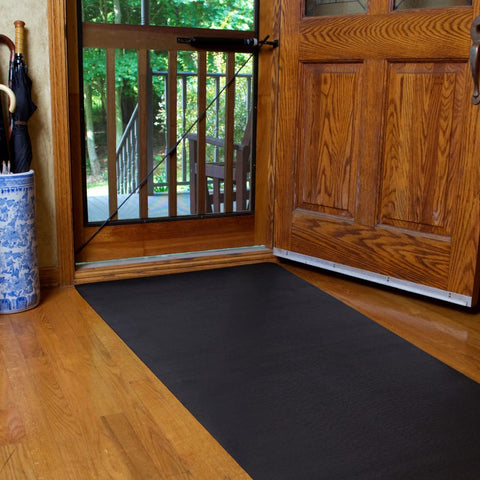 CLIMATEX indoor-outdoor mat protects floors in hallways and doors.