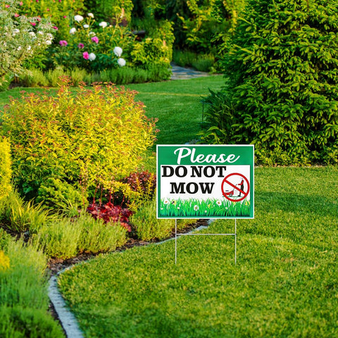 Cobee do not mow sign at garden entrance for clear guidance