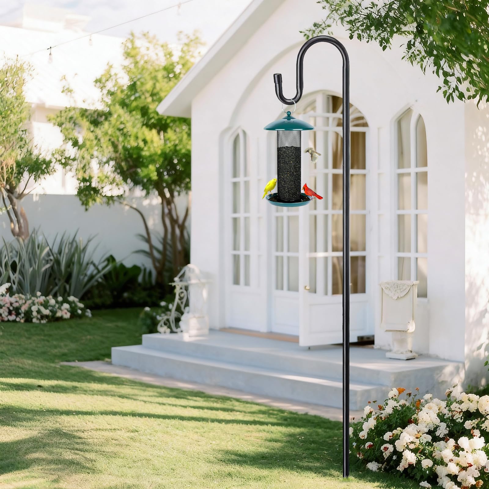 COCONUT floral basket hanger adds an elegant garden accent.