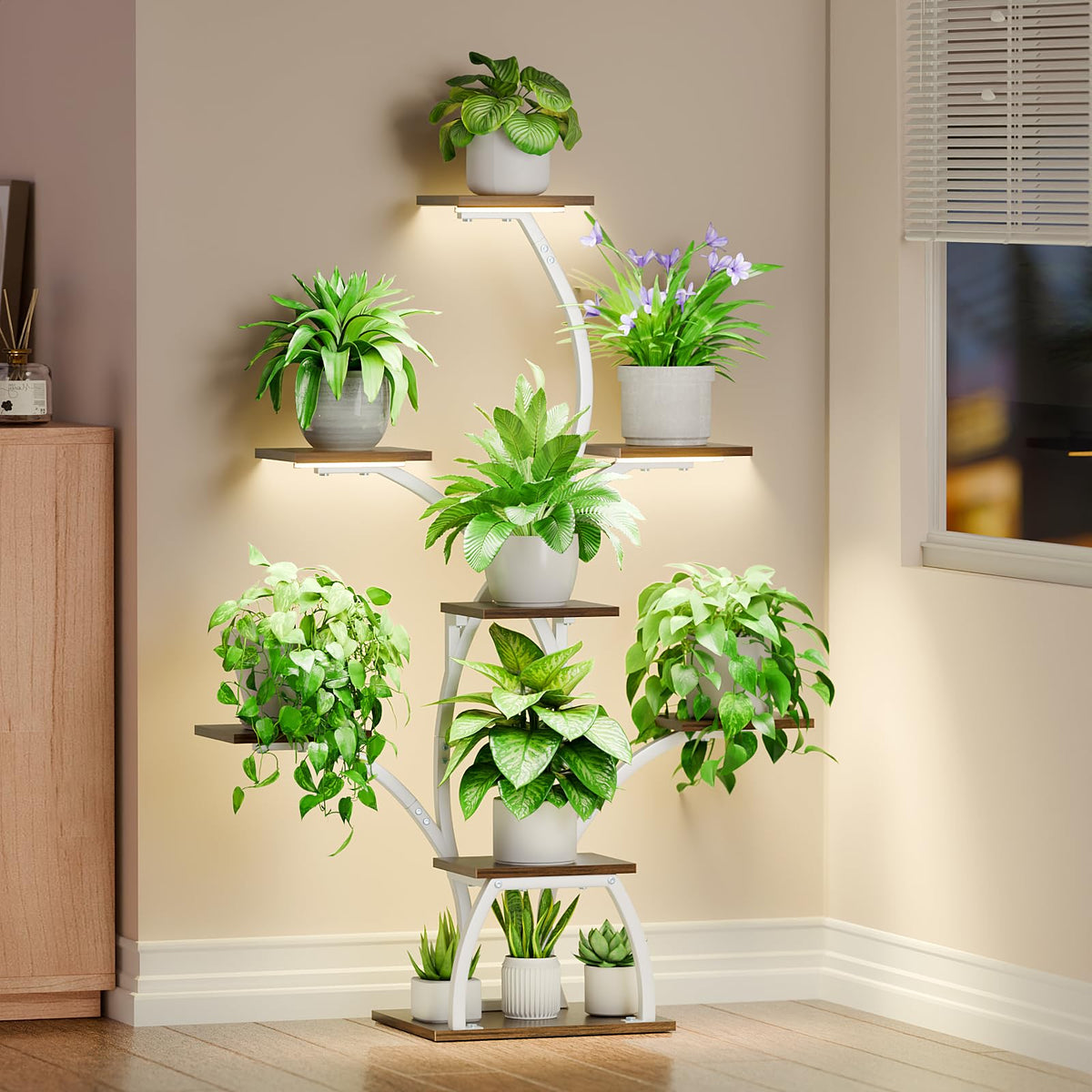 CODACE plant stand grow-light tree-6-tier displays lush indoor plants.