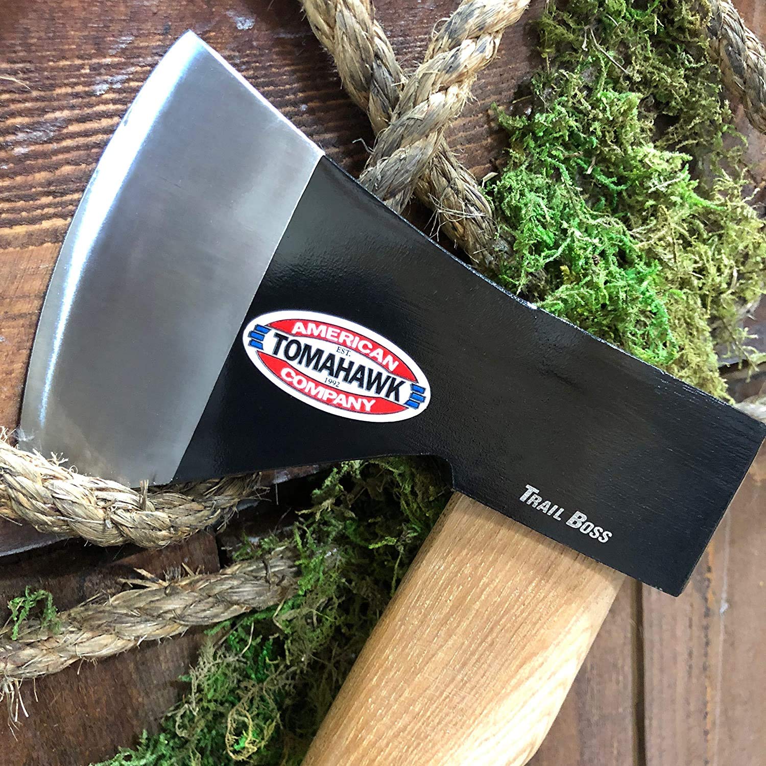 Cold Steel Trail Boss chopping a small tree with controlled swing.