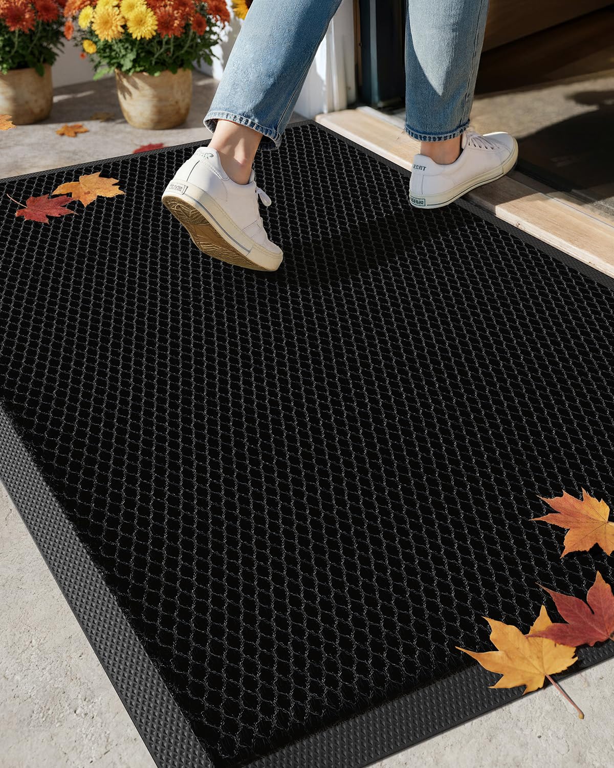 Color&Geometry high-stretch doormat at the front door traps dirt effectively.