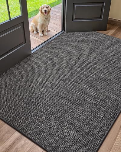 Color&Geometry large thin front door mat traps dirt at the entry.