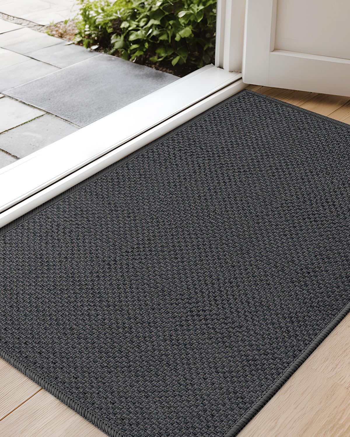 Color&Geometry ultra-thin door mat in gray, ideal for tight entryways and keeping floors clean.