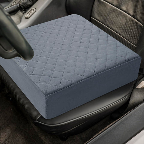 COMFORTANZA booster cushion adjustable strap demonstrates secure placement
