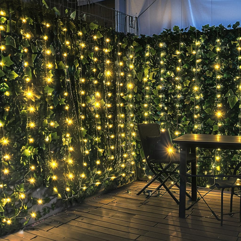 Comtelek artificial ivy privacy fence on balcony setup for instant privacy and decorative greenery.