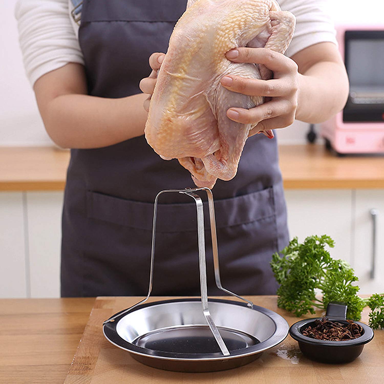 Coobbar 7x4 chicken roaster size fits 5-6 lb birds.