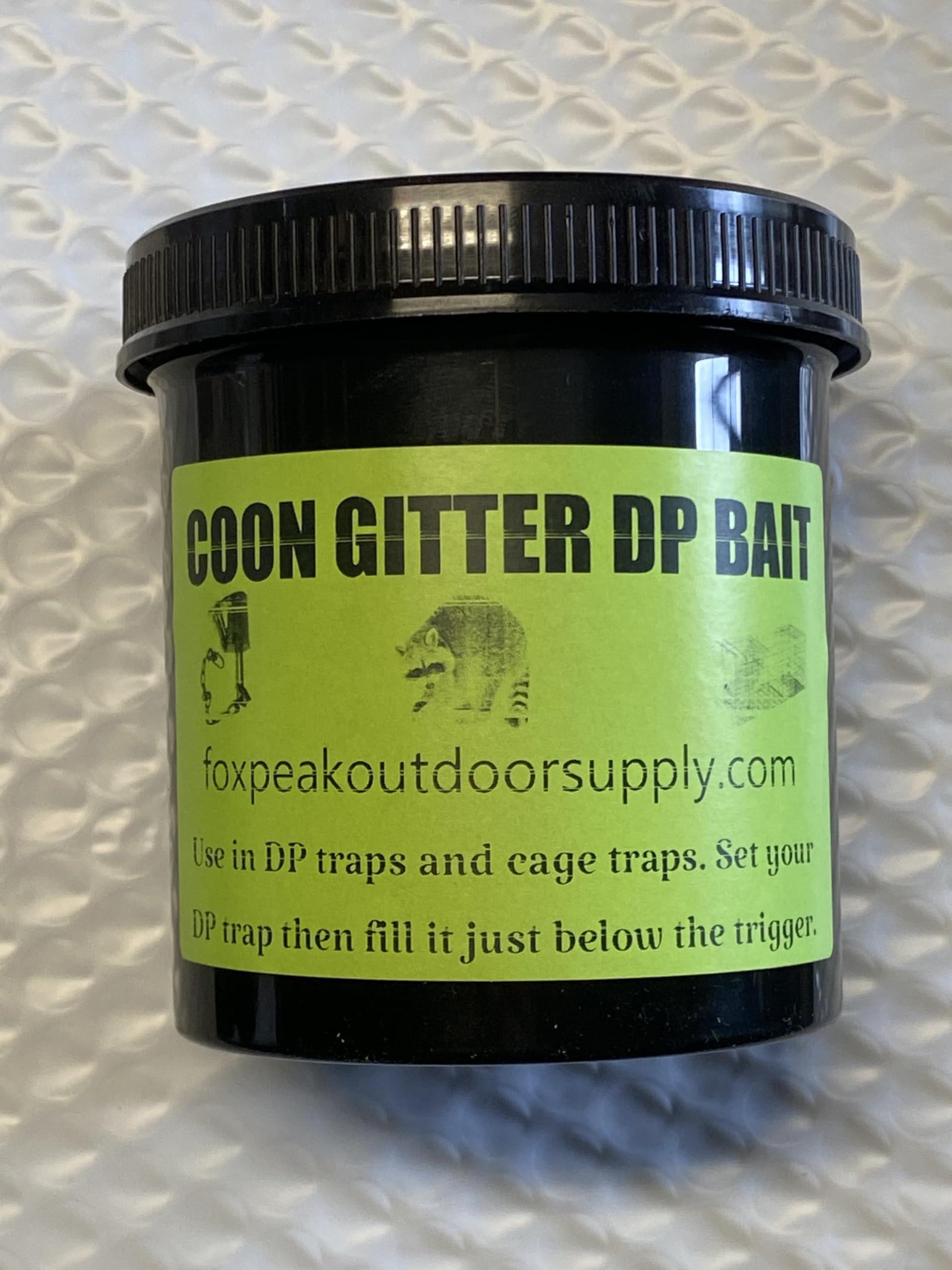 Coon Gitter Bait trap placement shows targeting raccoons along travel lanes.