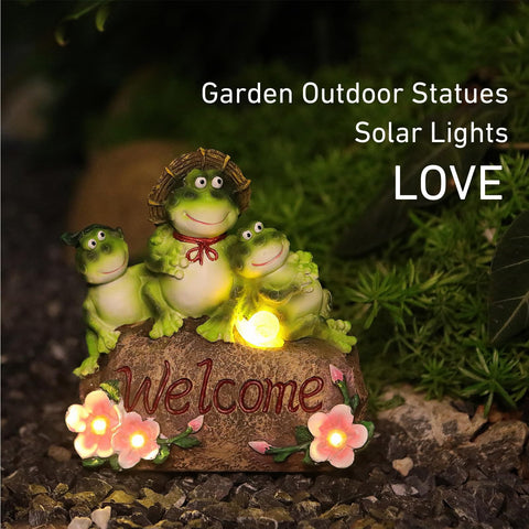 CORIETTA solar garden light frog statue illuminates paths after dark.