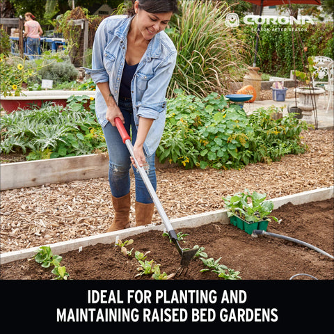 Corona GT3244 cultivator tines loosening soil and mixing compost